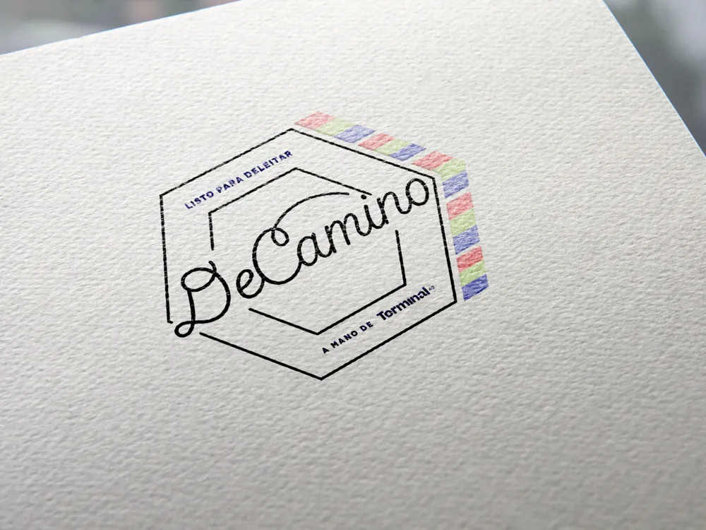 DeCamino badge printed on paper.